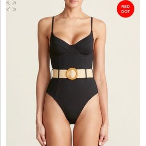 We wore what Danielle black one Piece. New.